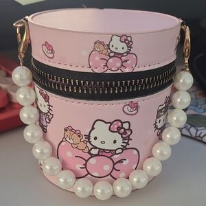 Hello Kitty Pink Cylinder Bag with Pearl Strap with 10 Lipgloss